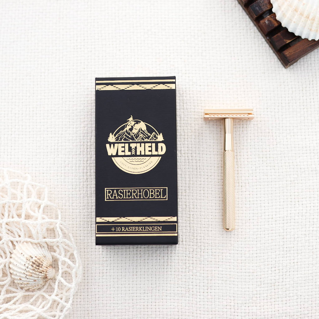 goldener Rasierhobel mit zehn Wechselklingen