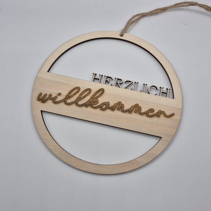 Holzschild "herzlich willkommen"