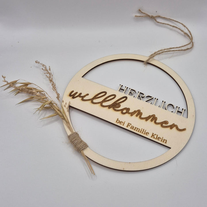 Holzschild "herzlich willkommen"